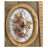 Flower bouquet under convex glass wall plaque