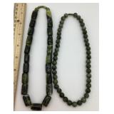2 heavy green stone necklaces