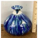 Blue cased glass vase