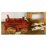 Vintage cast iron horse-drawn fire wagon