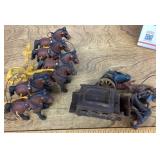 Assorted cast-iron figures, horses, and parts