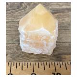 Polished large point orange calcite