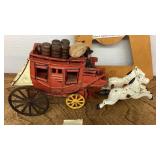 Vintage cast-iron horse-drawn stagecoach