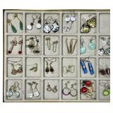 23 pairs of pierced earrings
