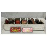 Assorted staples in wooden box