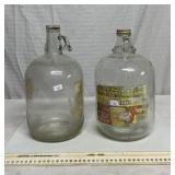 2 glass 1-gallon apple cider jugs