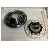 Vintage hubcaps-1 Chevy, 1 Ford