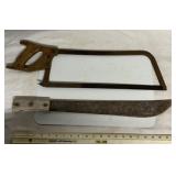 Vintage machete and bone saw