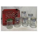 Milk crate with 6 glass storage jars