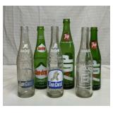 6 glass soda bottles