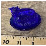 Mini cobalt blue glass cow on nest