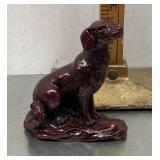 Red resin dog figure