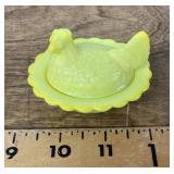 Mini yellow glass hen on nest