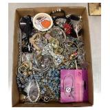 Flat of costume jewelry