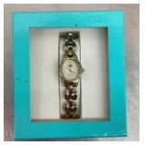 NEW ladies' watch