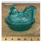Aqua glass hen on nest