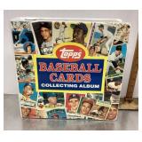 Baseball card collecting album with cards