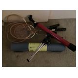 Yoga mat, badminton racquets, telescope