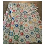 Hand stitched Grandmother's Flower Garden quilt