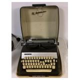 Adler portable manual typewriter with case