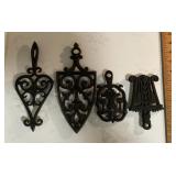 4 cast iron trivets
