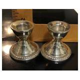 Pair of weighted sterling Duchin candleholders