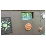 4 sun outdoor wall decor --on back of house