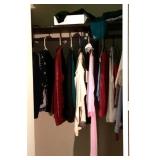 Clothes in closet --mostly women Size L/XL