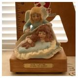 Musical guardian angel figure