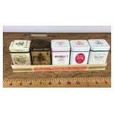 5 tobacco tins