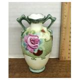 Hand painted porcelain vase with roses