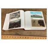 Old postcards in album