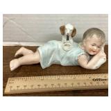 Bisque piano baby with dog