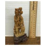 Carved soapstone fisherman figure