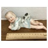 German bisque piano baby with rabbit
