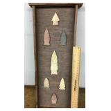 7 arrow points mounted on board