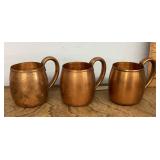 3 copper mugs