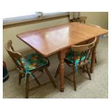 30x45 table and 4 chairs