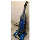Hoover vacuum cleaner --powers on