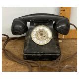 Heavy antique rotary telephone