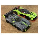 2 assembled Lego cars