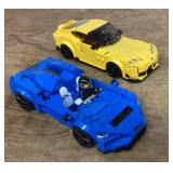 2 assembled Lego cars