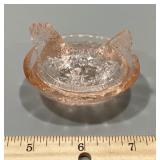 Mini pink glass hen on a nest