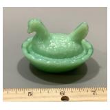Mini green milk glass hen on a nest