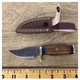 Fixed blade pocket knife with sheath