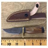 Fixed blade pocket knife with sheath