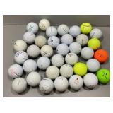 Bag of used Maxfli golf balls