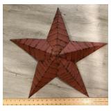 Farmhouse-style metal star wall decor