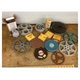 Collection of film reels and camera supplies