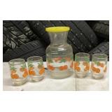 Orange juice decanter and 4 glasses